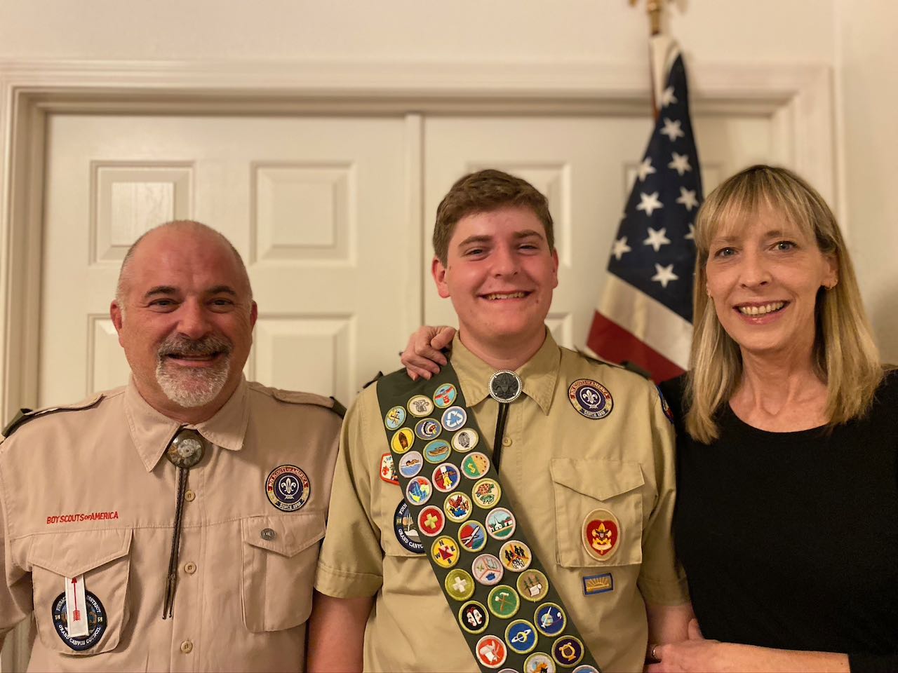 Eagle scout with parents